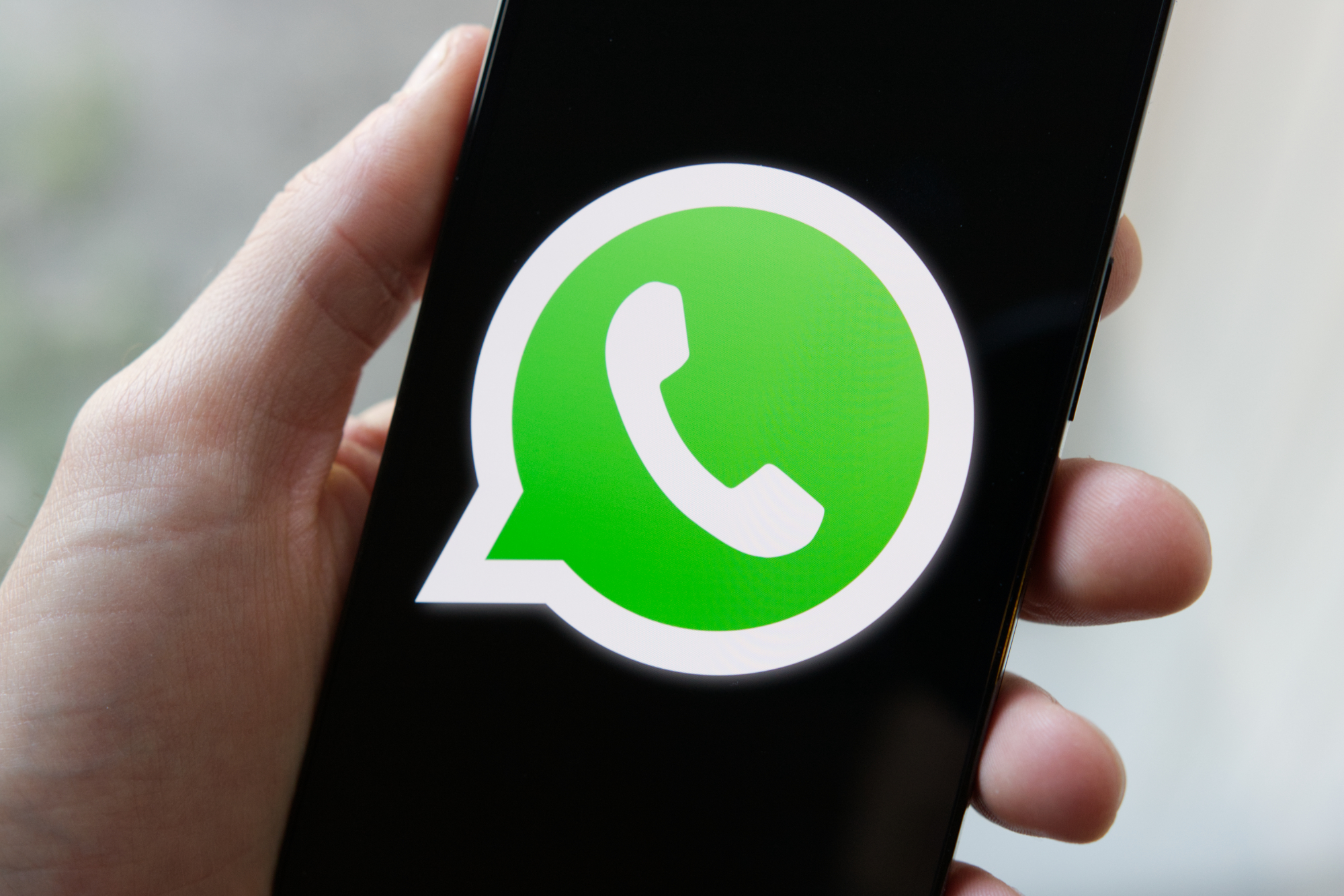 whatsapp-logo-phone-close